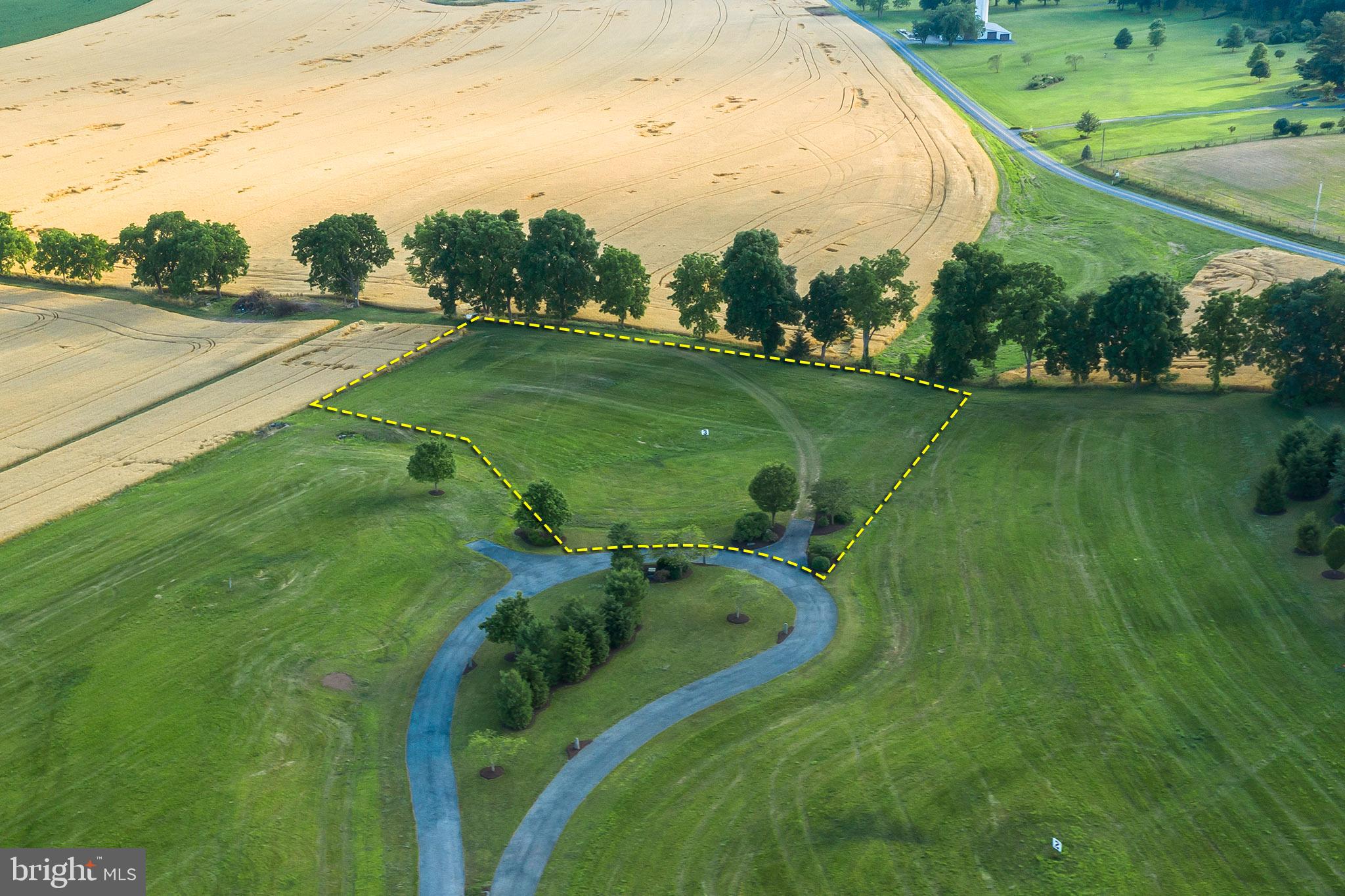 a view of a golf course with a lake