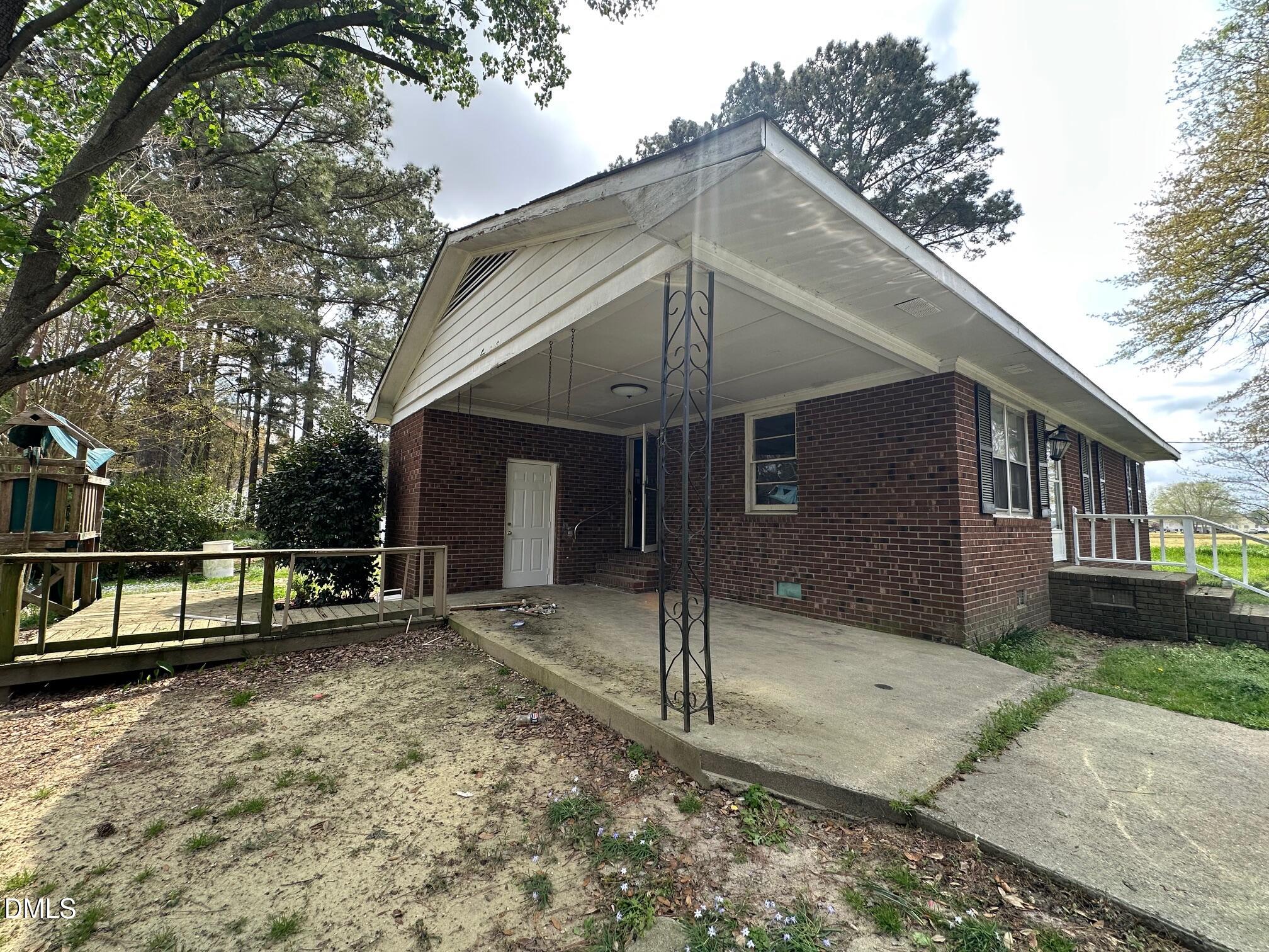 209 Greenacres Road Snow Hill, NC 28580 - Photo 2 of 15 a front view of a house with a yard