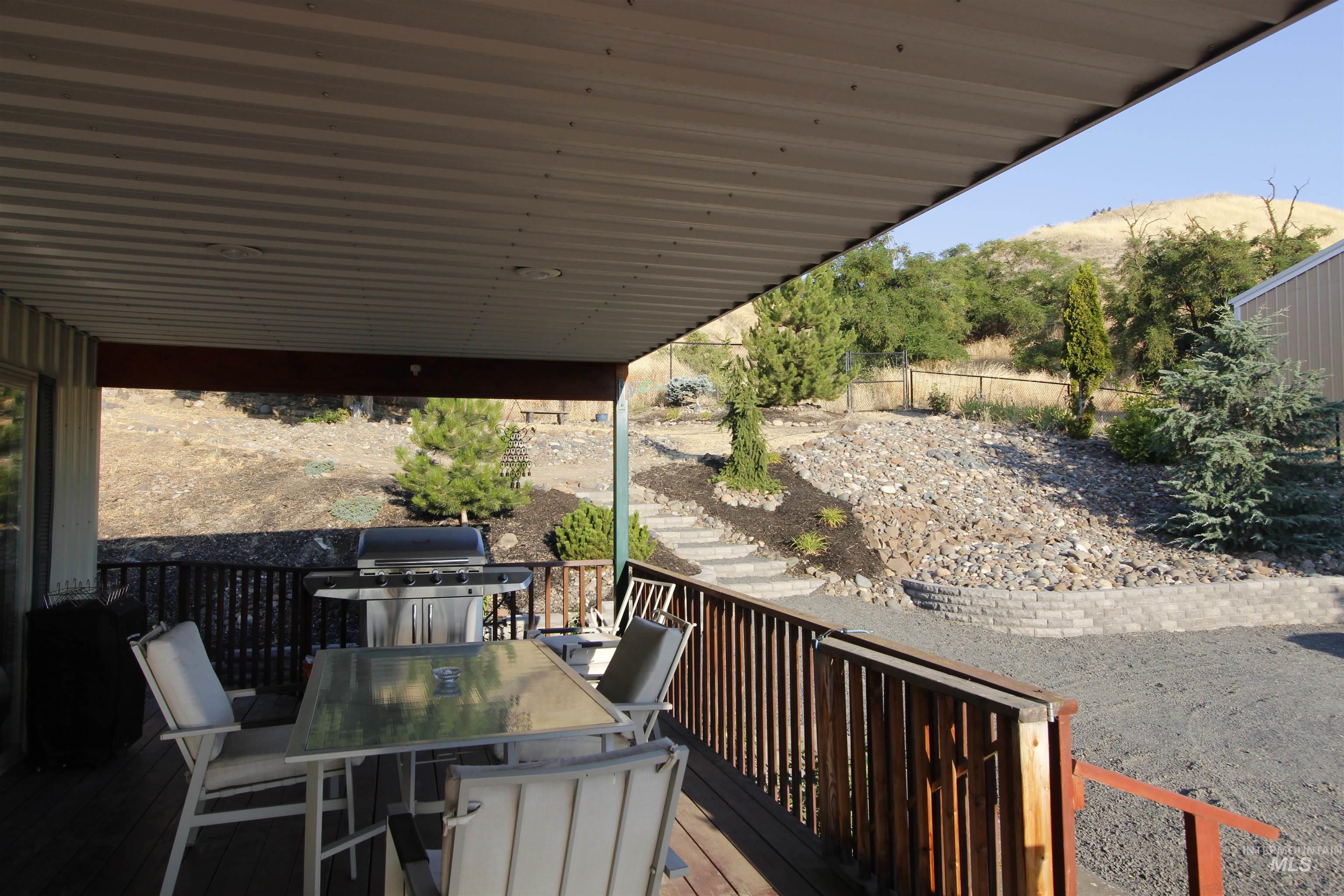 3350 Clemans Road Clarkston, WA 99403 - Photo 20 of 50 Deck featuring outdoor dining space and area for grilling