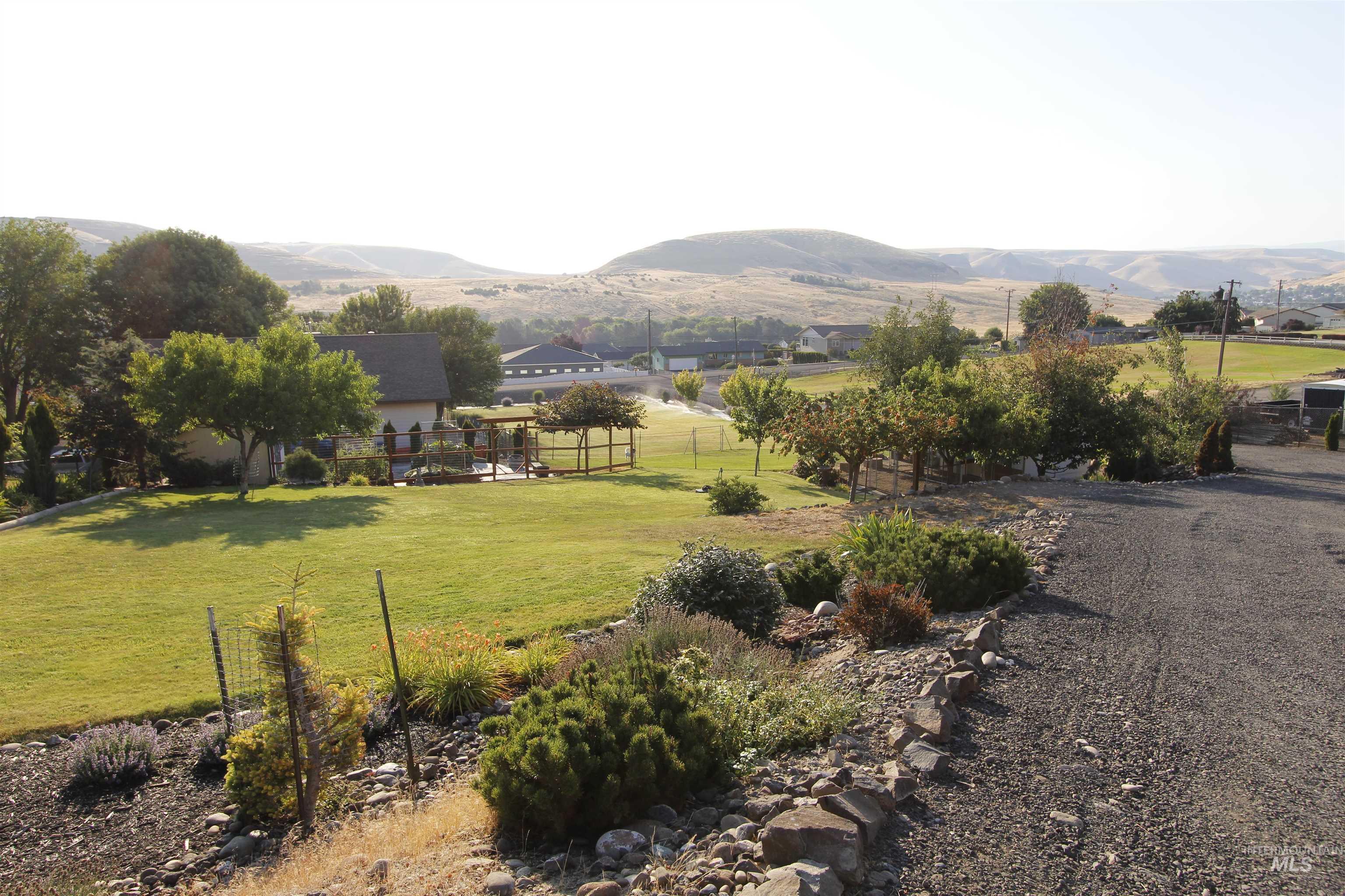 3350 Clemans Road Clarkston, WA 99403 - Photo 3 of 50 View of yard featuring a mountain view and a rural view