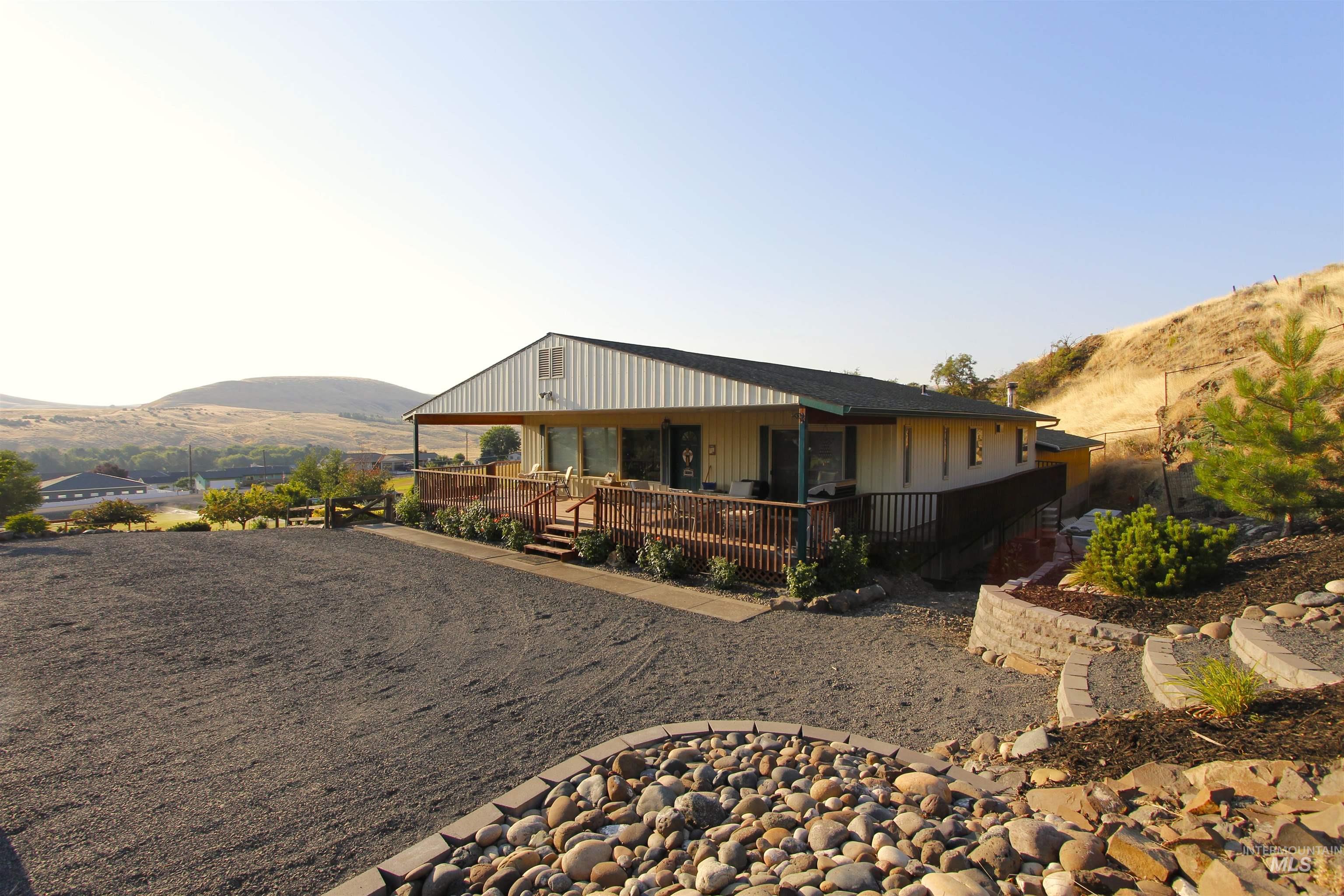 3350 Clemans Road Clarkston, WA 99403 - Photo 4 of 50 View of front of house featuring a mountain view and covered porch