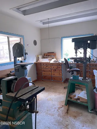 a room with furniture and a window