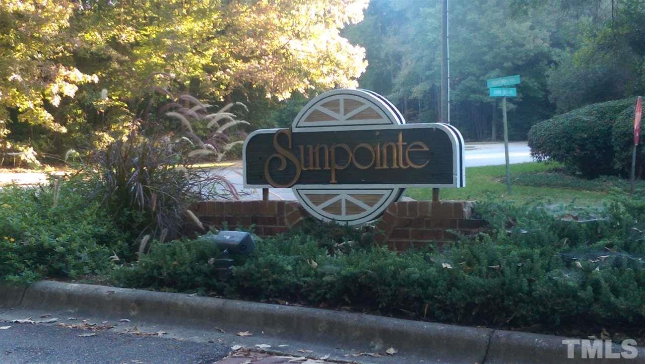 6151 Summer Pointe Place, Unit 202 Raleigh, NC 27606 - Photo 16 of 21 a view of a park that has a sign on it