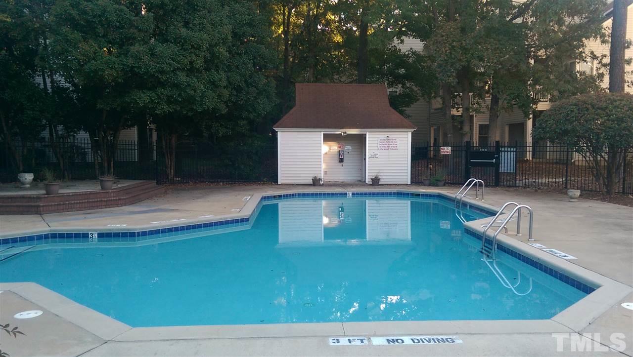 6151 Summer Pointe Place, Unit 202 Raleigh, NC 27606 - Photo 21 of 21 a view of a house with pool