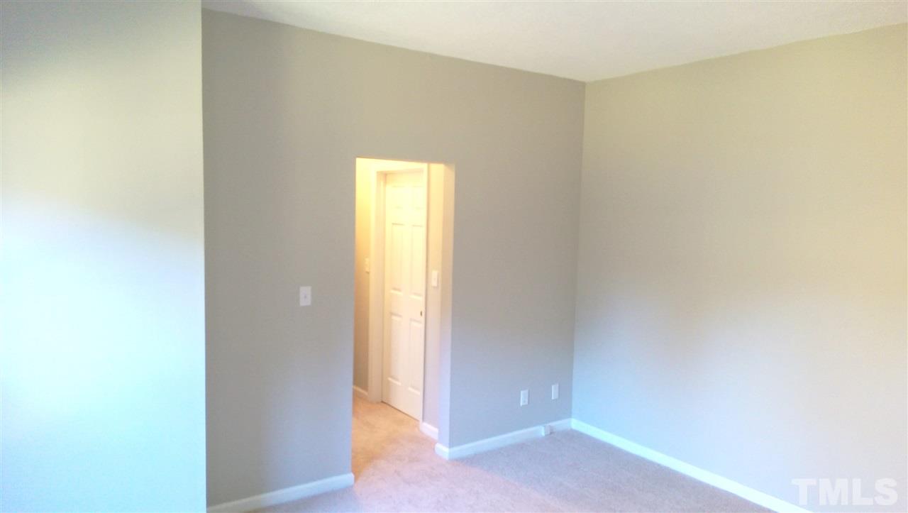 6151 Summer Pointe Place, Unit 202 Raleigh, NC 27606 - Photo 10 of 21 a view of an empty room