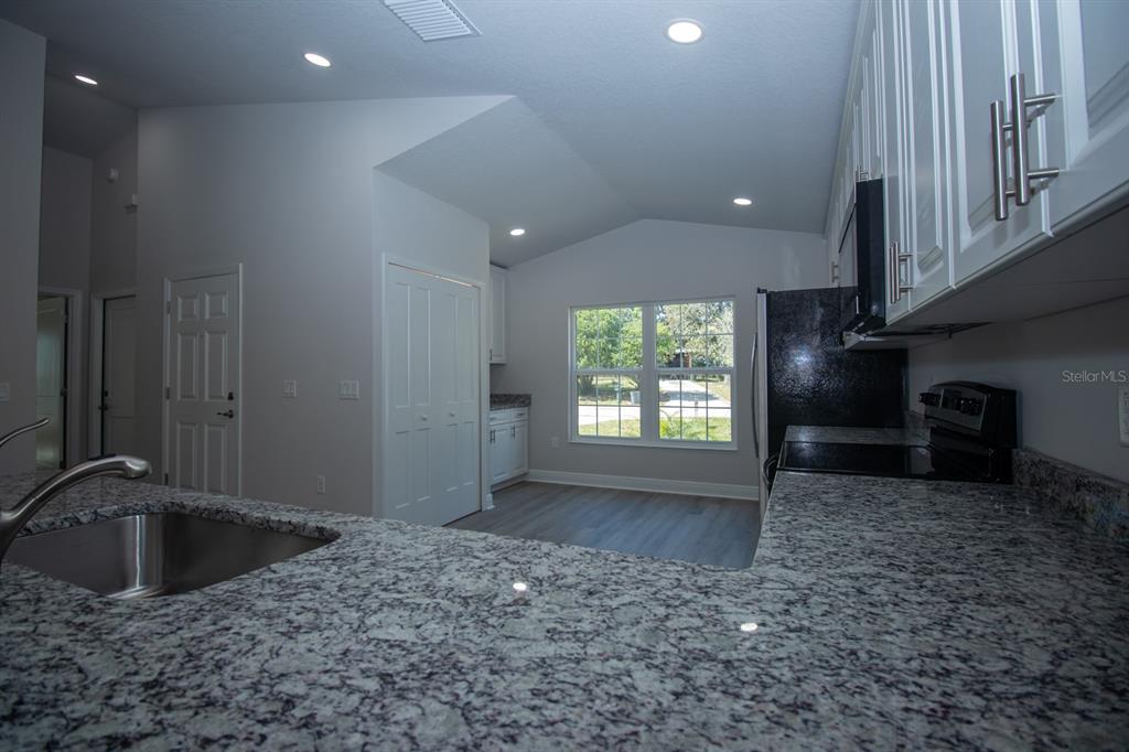 5422 Charles Street New Port Richey, FL 34652 - Photo 12 of 30 a view of a storage & utility room