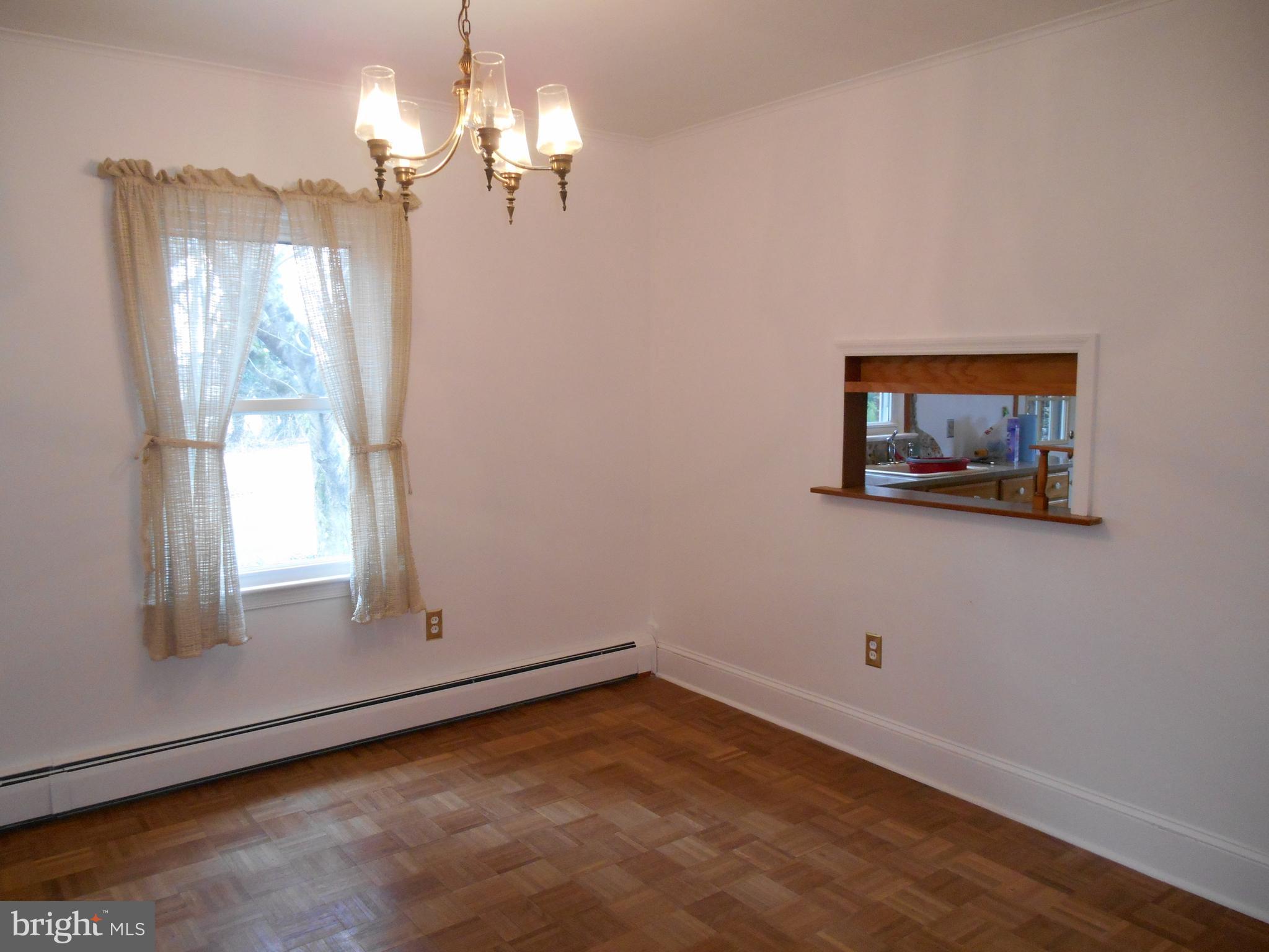 10015 New Bridge Road Denton, MD 21629 - Photo 15 of 30 Opening in wall is into kitchen
