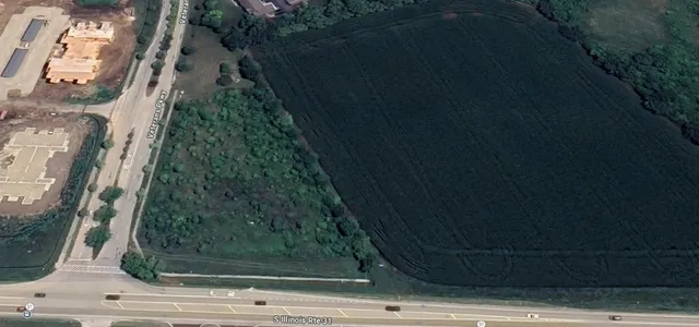a view of a hallway with stairs