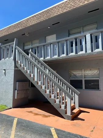 a view of balcony with large window