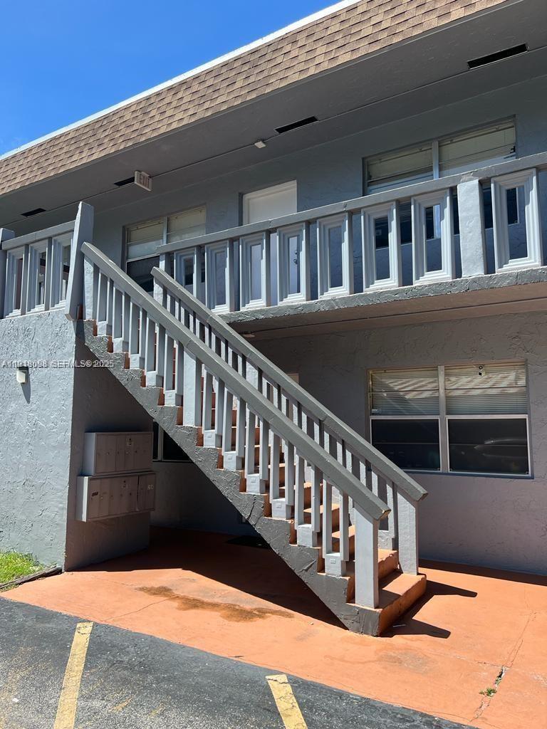 3265 Griffin Road, Unit 101 Dania Beach, FL 33312 - Photo 1 of 4 a view of balcony with large window