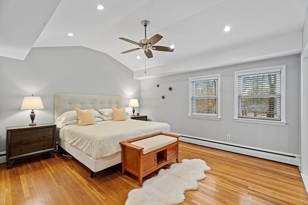 66 Old Right Road Ipswich, MA 01938 - Photo 18 of 36 a bedroom with a bed and wooden floor