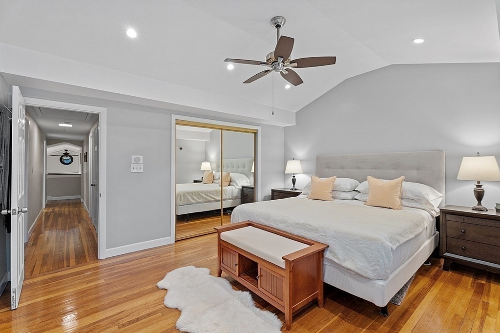 66 Old Right Road Ipswich, MA 01938 - Photo 19 of 36 a bedroom with a bed and wooden floor