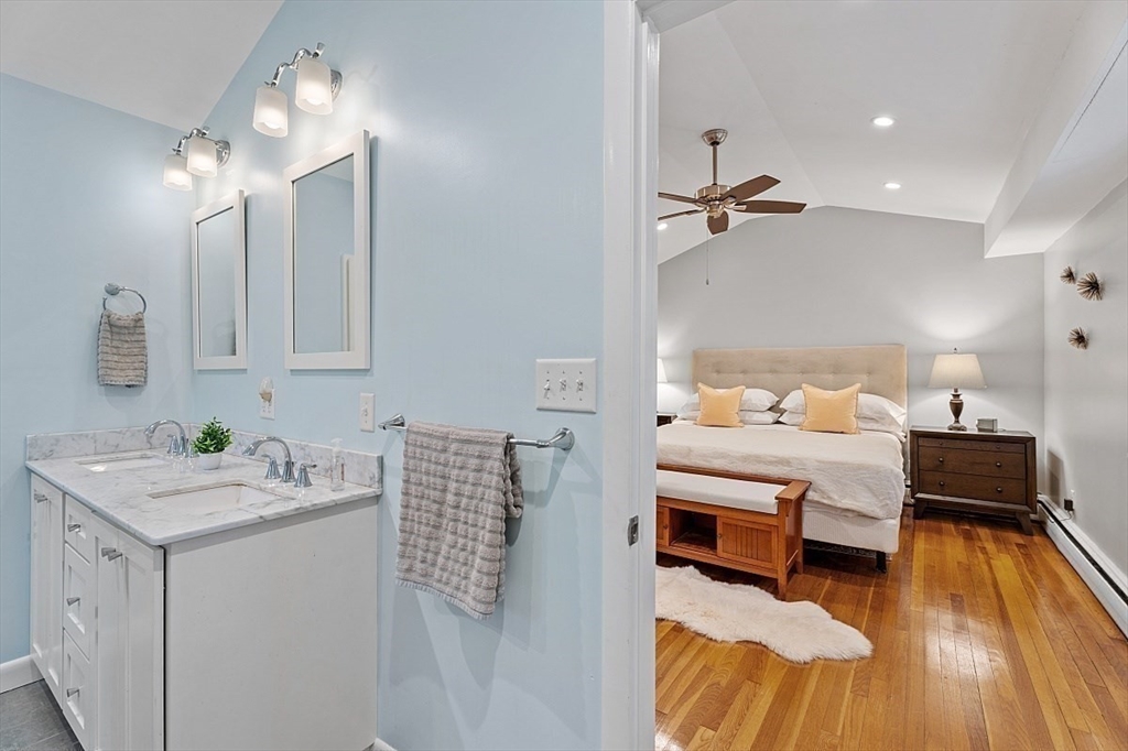 66 Old Right Road Ipswich, MA 01938 - Photo 20 of 36 a en suite bathroom with a double vanity sink and a mirror