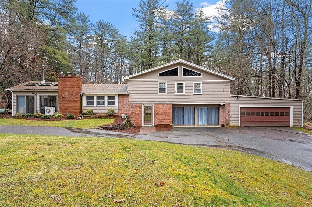 66 Old Right Road Ipswich, MA 01938 - Photo 2 of 36 a front view of a house with a yard and swimming pool