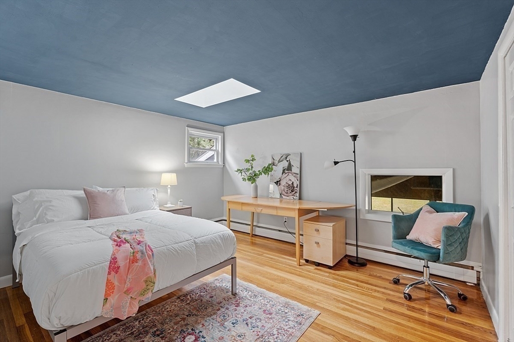 66 Old Right Road Ipswich, MA 01938 - Photo 23 of 36 a spacious bedroom with a bed and a desk