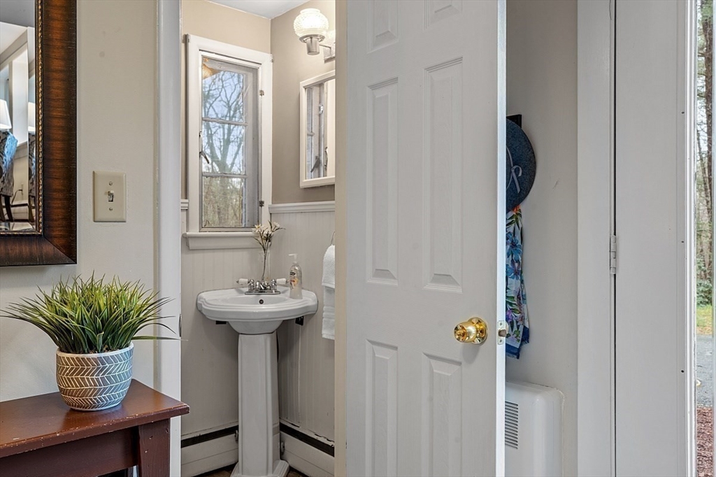 66 Old Right Road Ipswich, MA 01938 - Photo 29 of 36 a bathroom with a sink and a mirror