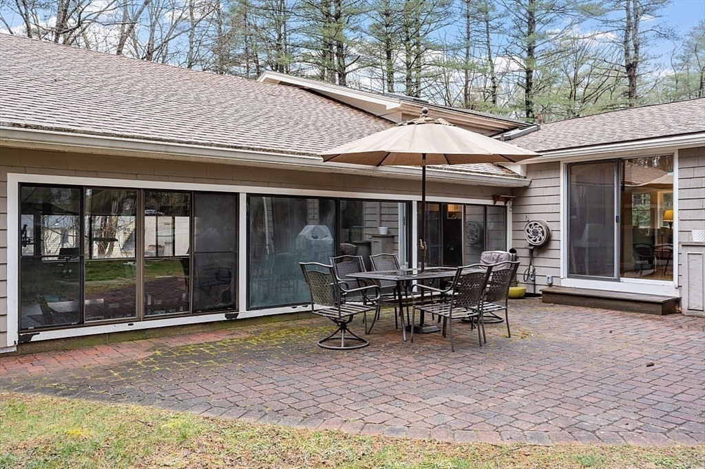 66 Old Right Road Ipswich, MA 01938 - Photo 33 of 36 a patio with table and chairs