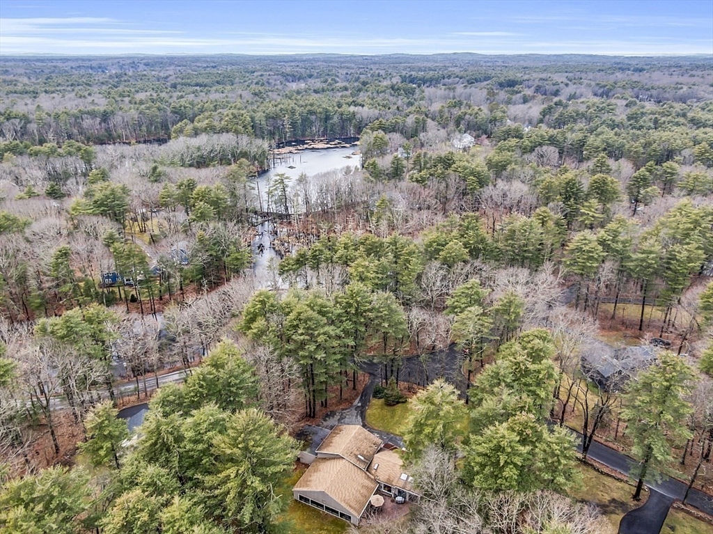 66 Old Right Road Ipswich, MA 01938 - Photo 36 of 36 a view of a city with lush green forest