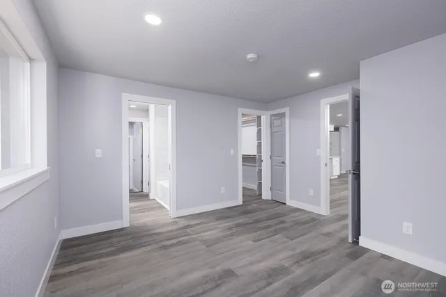 a view of entryway with wooden floor