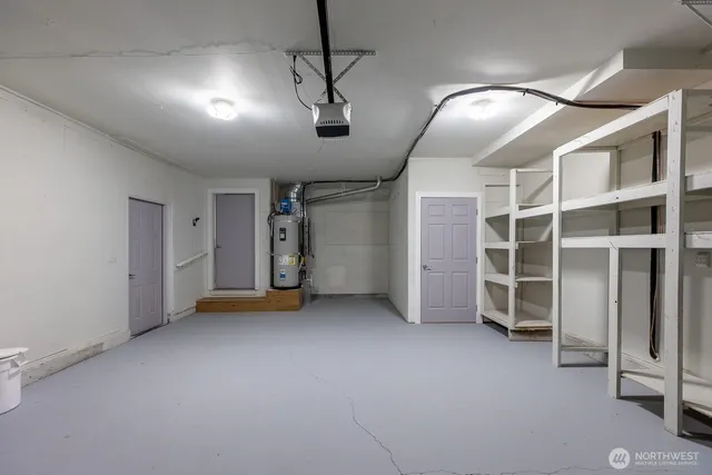 an empty room with a empty space and windows