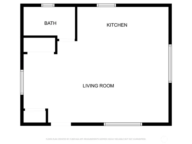 a picture of a bench in a white building