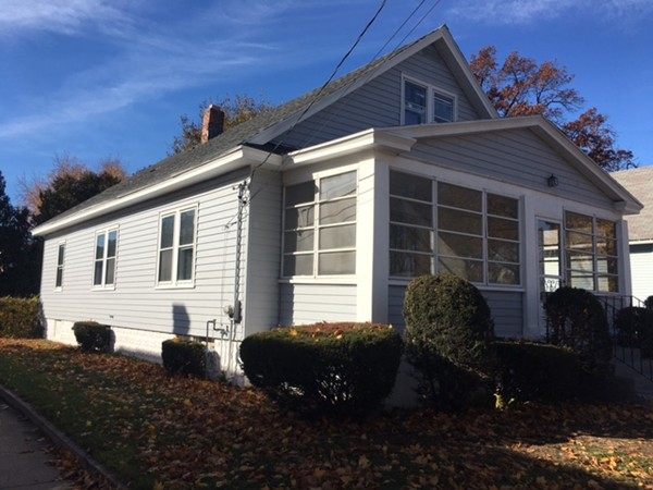 78 Fresno Street Springfield, MA 01104 - Photo 1 of 17 a front view of a house with a yard