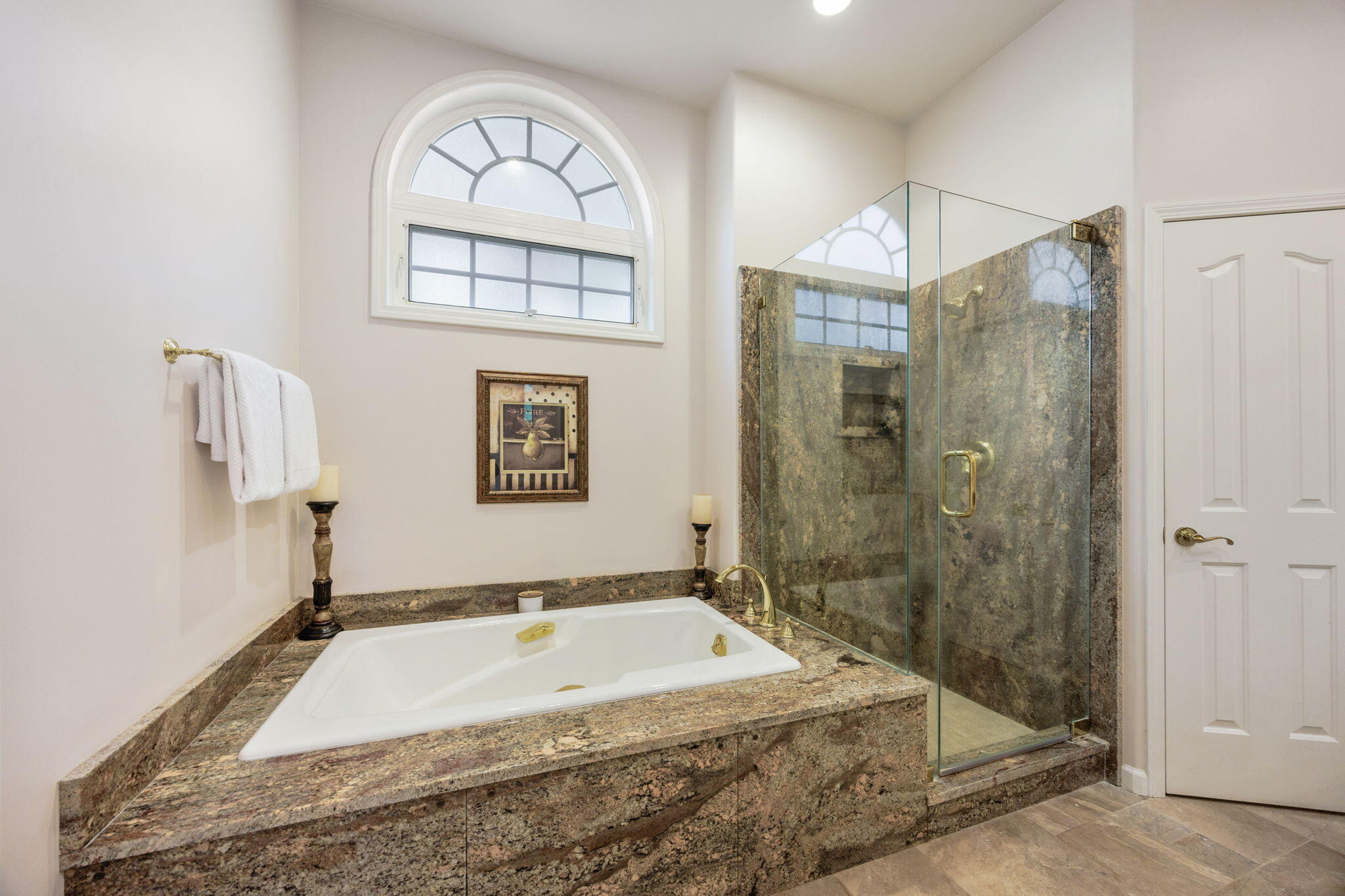 7081 Redthorne Road Rogue River, OR 97537 - Photo 32 of 58 a spacious bathroom with a granite countertop sink a shower and a mirror
