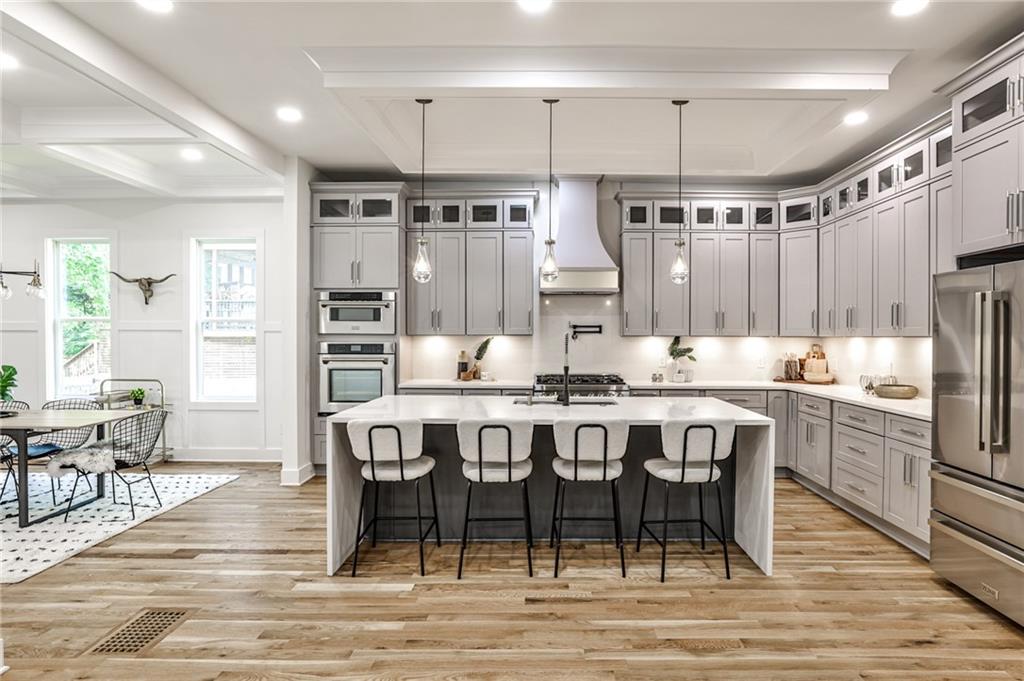 1401 Rupert Road Decatur, GA 30030 - Photo 12 of 43 a large kitchen with a table and chairs