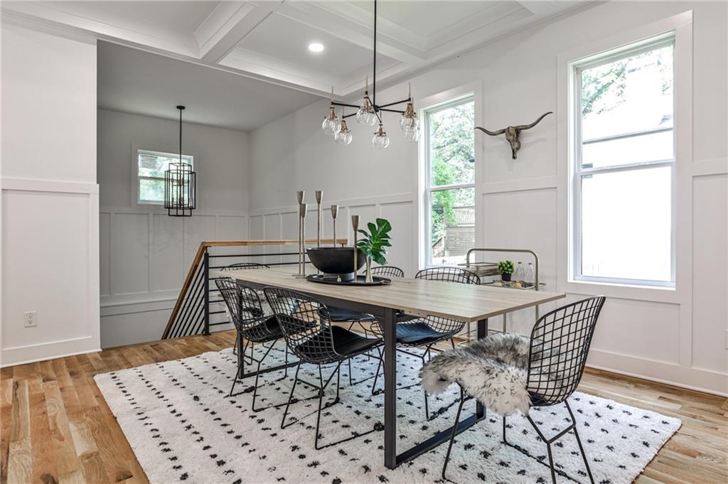 1401 Rupert Road Decatur, GA 30030 - Photo 14 of 43 a view of a dining room with furniture window and wooden floor