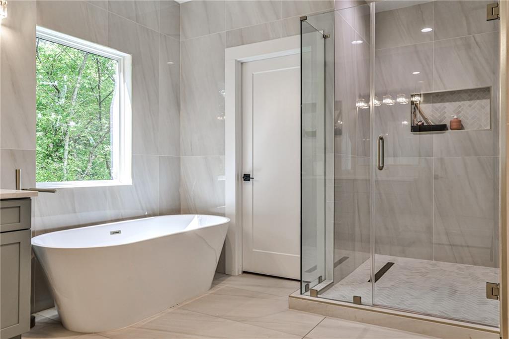 1401 Rupert Road Decatur, GA 30030 - Photo 20 of 43 a bathroom with a bathtub and shower