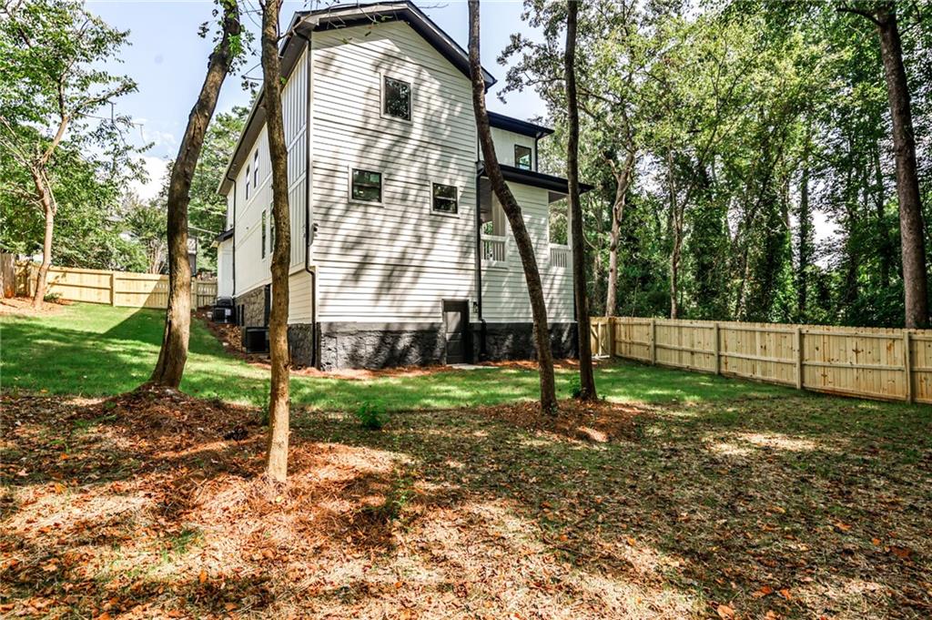 1401 Rupert Road Decatur, GA 30030 - Photo 42 of 43 a view of a house with a yard and sitting area