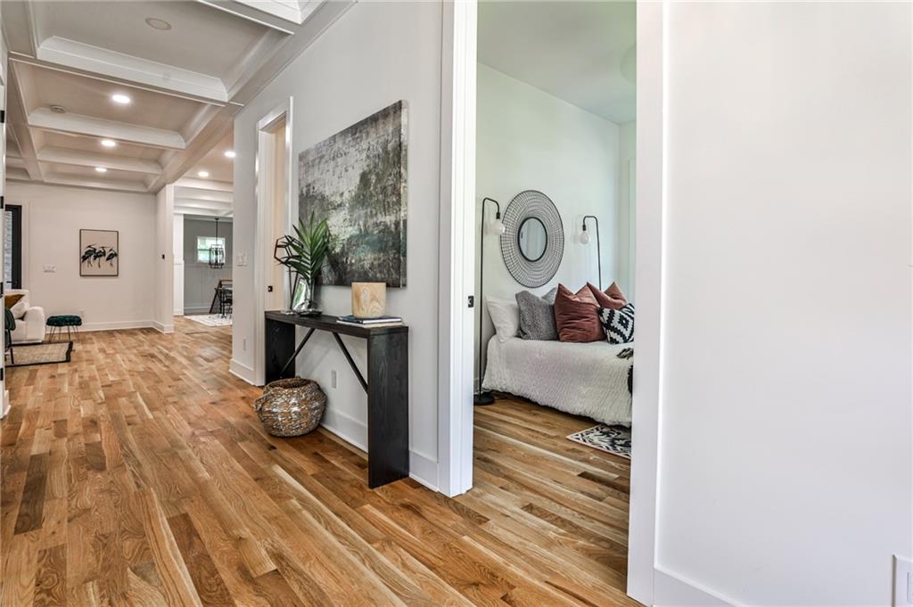 1401 Rupert Road Decatur, GA 30030 - Photo 5 of 43 a bedroom with a bed and wooden floor