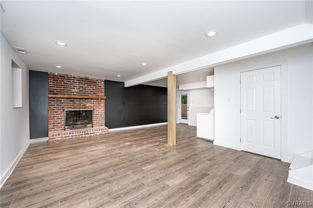 10523 White Rabbit Road North Chesterfield, VA 23235 - Photo 14 of 23 a view of an empty room with a fireplace and a window