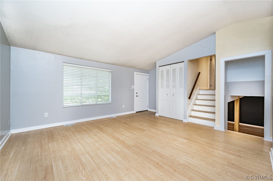 10523 White Rabbit Road North Chesterfield, VA 23235 - Photo 3 of 23 a view of empty room with wooden floor and stairs
