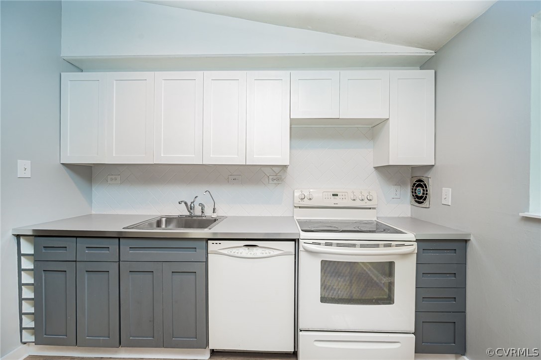 10523 White Rabbit Road North Chesterfield, VA 23235 - Photo 6 of 23 a kitchen with granite countertop white cabinets and white appliances