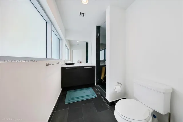 a view of staircase with furniture