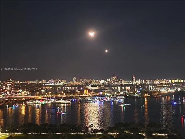 a view of a city with tall buildings