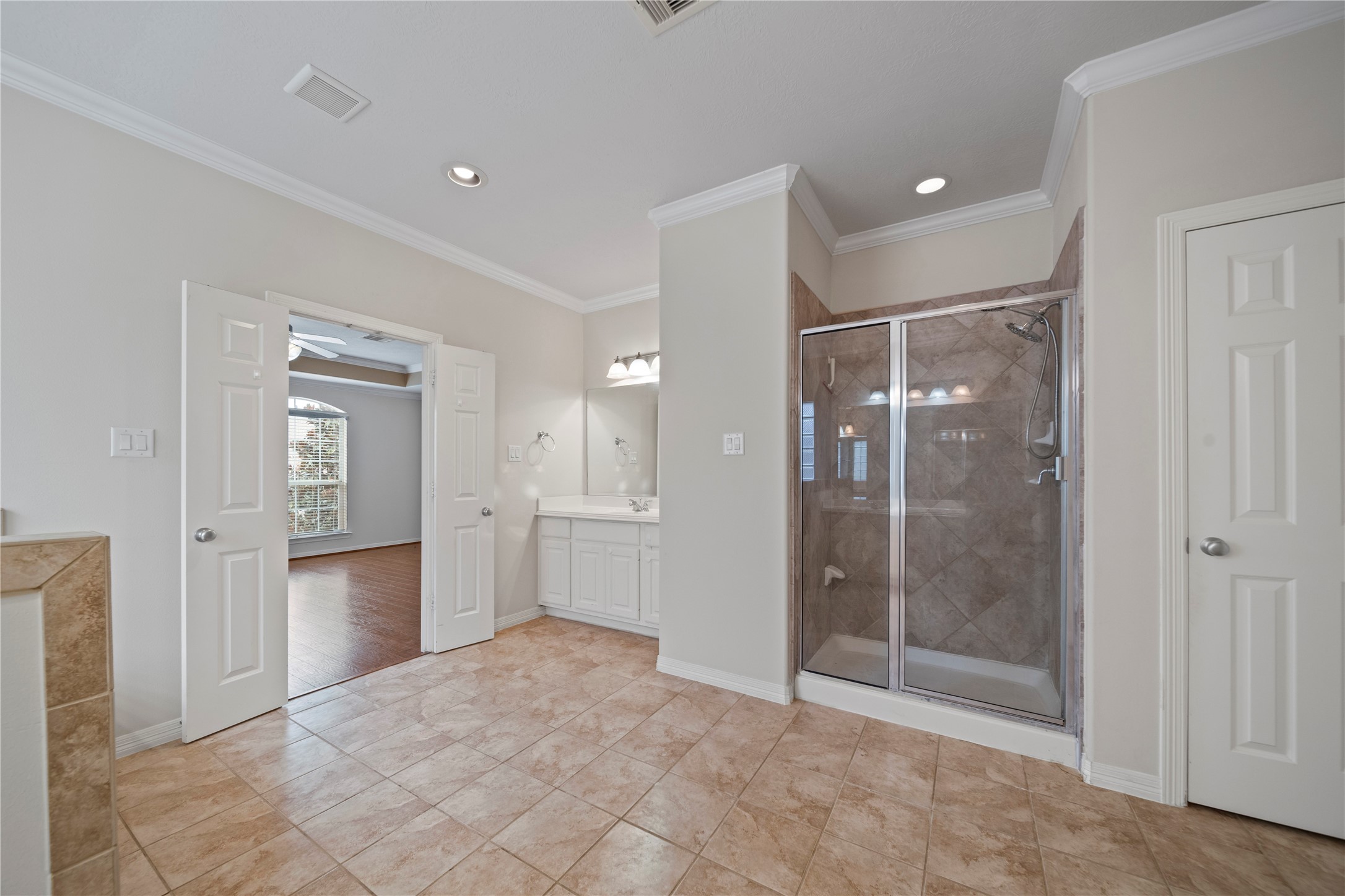14443 Basalt Lane Houston, TX 77077 - Photo 23 of 39 a bathroom with a shower and a sink