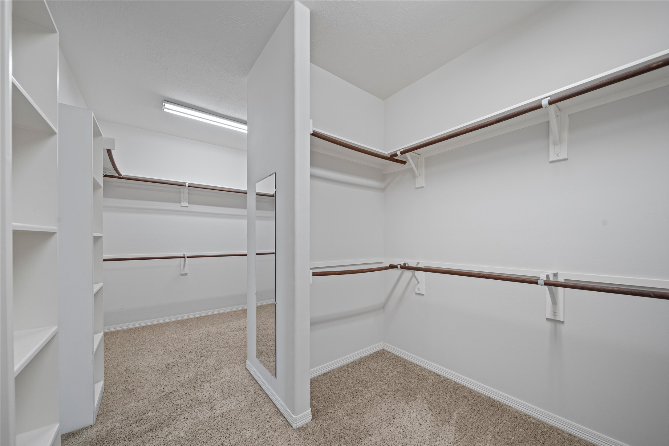 14443 Basalt Lane Houston, TX 77077 - Photo 24 of 39 a view of an empty walk in closet