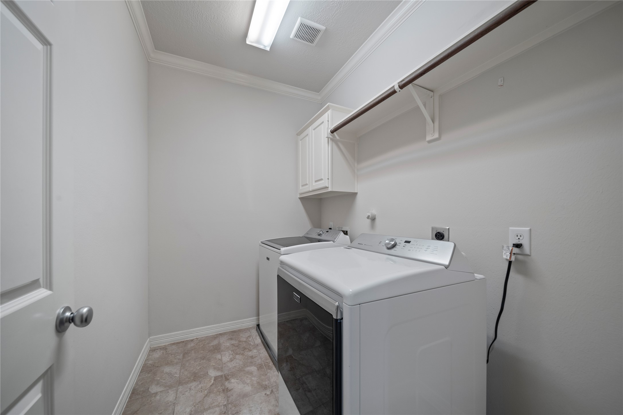 14443 Basalt Lane Houston, TX 77077 - Photo 30 of 39 a utility room with dryer and washer