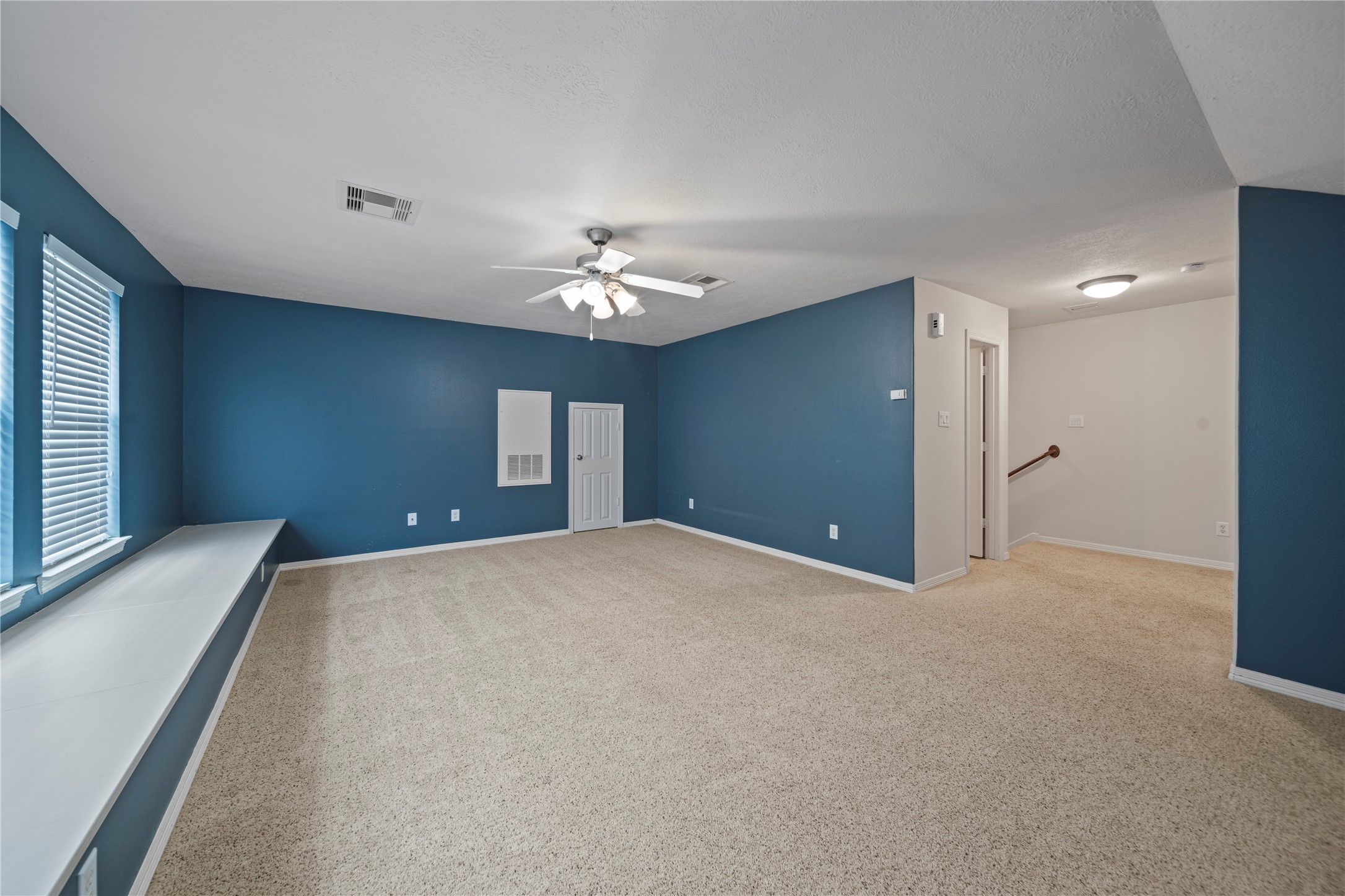 14443 Basalt Lane Houston, TX 77077 - Photo 33 of 39 a view of an empty room with a chandelier