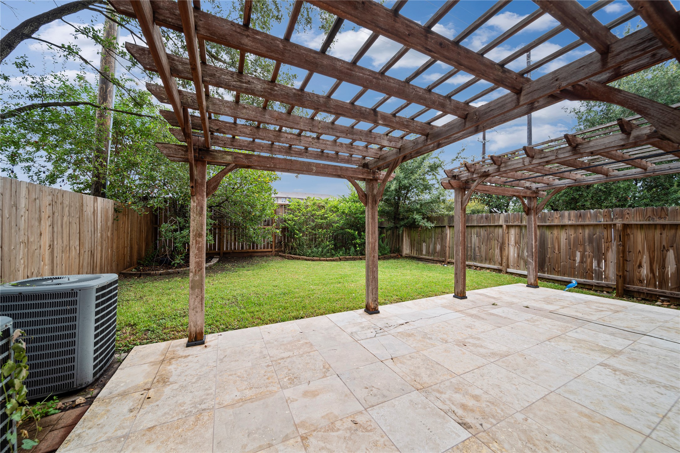 14443 Basalt Lane Houston, TX 77077 - Photo 36 of 39 a view of yard with porch and wooden fence