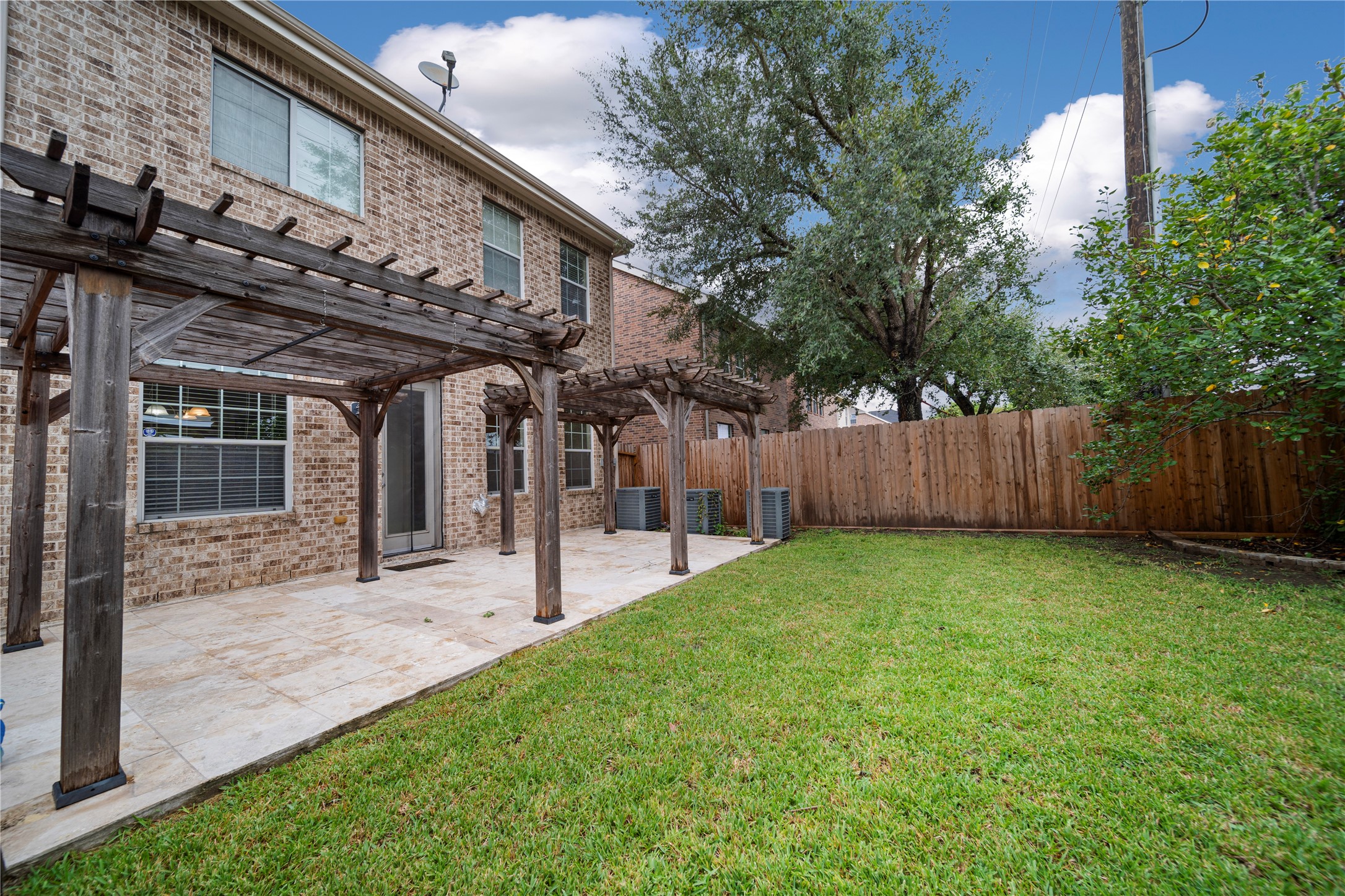 14443 Basalt Lane Houston, TX 77077 - Photo 38 of 39 a view of a house with a backyard