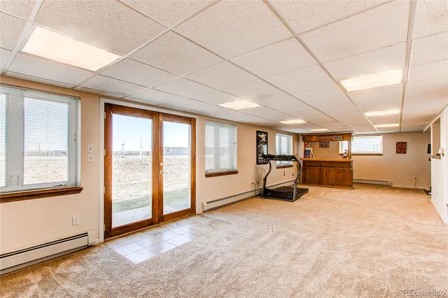 a room with furniture and a flat screen tv