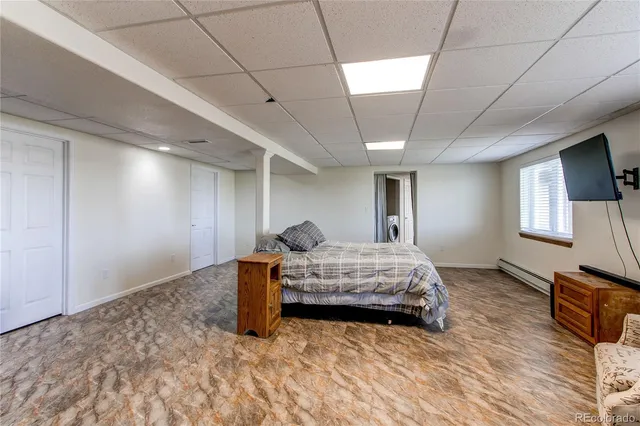 a kitchen with stainless steel appliances granite countertop a sink a stove and refrigerator