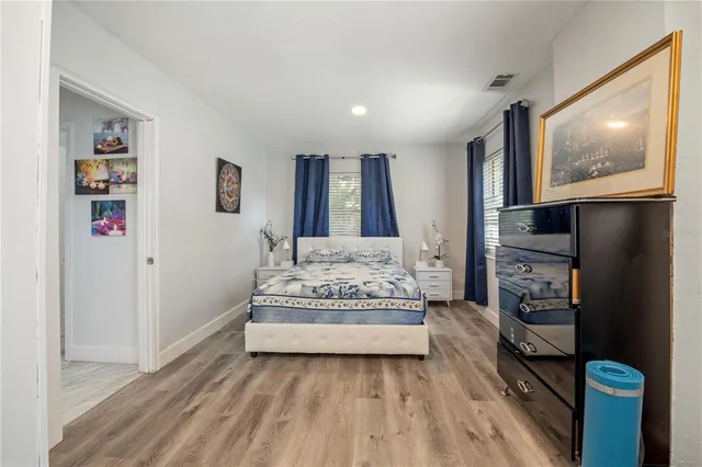 a view of a workspace with furniture and windows