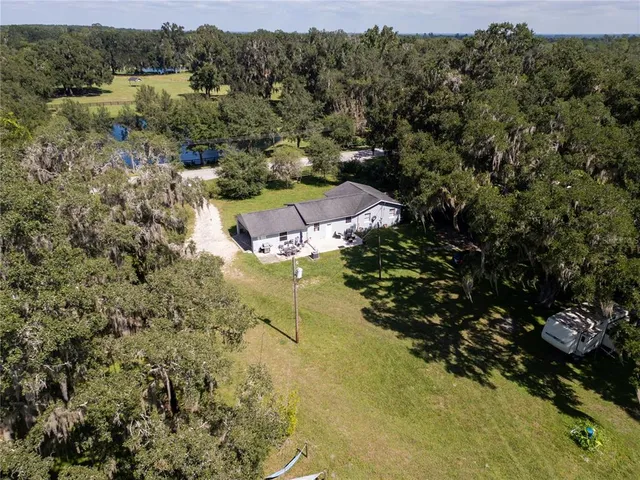 a view of swimming pool with a yard