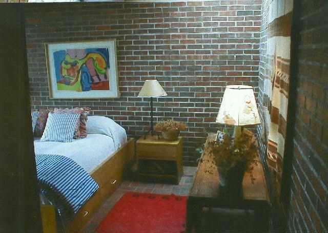 966 East Menzemer Road Elizabeth, IL 61028 - Photo 9 of 9 a balcony with couch and a potted plant