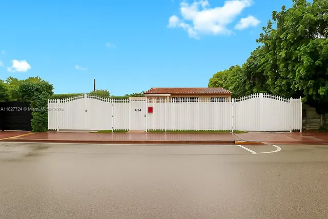 a view of a swimming pool and an outdoor space