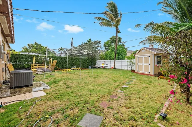 a house view with a garden space